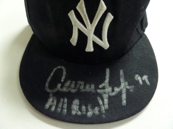This fitted New York Yankees traditional style cap is in EX/MT condition, and comes hand-signed on the top of the bill in silver sharpie by reigning AL MVP, Aaron Judge.  The signature grades an overall 8, including All Rise! and 99 inscriptions, and retail is mid hundreds!