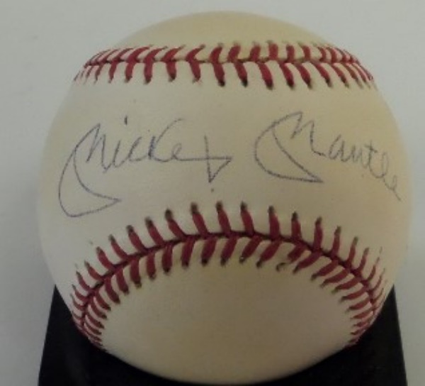 This Official American League Baseball from Rawlings is in VG+ overall condition, and comes hand-signed in blue ink right across the sweet spot by one of the game's true legends, Yankees HOF outfielder, Mickey Mantle.  Signature here is a legible 7.5, and with Mantle gone now over two and a half decades, retail is high hundreds!