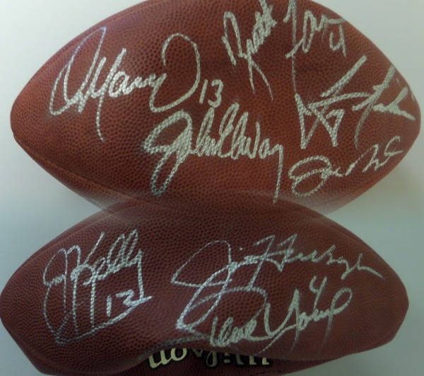 This mint, leather, full-sized game ball is silver paint pen signed by 8 HOF QB's and grades a solid 9 or better all over. Names include Favre, Montana, Elway, Marino, Kelly, Young and Aikman, and value of this Canton prize is well over a grand. 