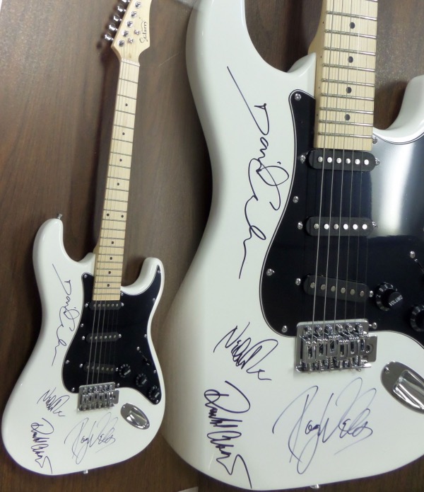 This mint white electric beauty comes in the original box with all accessories included. It is STUNNING and comes signed by ROGER WATERS, DAVID GILMOUR, RICHARD WRIGHT, & NICK MASON!  All of the autographs are in great shape and this retails well into the low thousands from 1 of classic rocks all time great bands. 