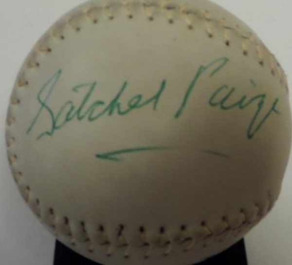 This white-laced Official Approved Softball from MacGregor/Harwood is still in EX/EX+ shape overall, and comes side panel-signed by perhaps the greatest pitcher of all time, Negro League legend and HOF'er, Satchel Paige.  The signature, which is in GREEN ink, grades about a 7.5 overall, and with Paige's death now 40 years ago, retail is low thousands!