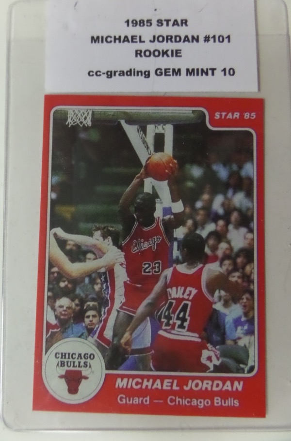 This STAR Basketball card from 1985 Star is card #101 which is Michael Jordan's TRUE ROOKIE Card, and comes graded by cc-Grading at GEM MINT 10. I cannot find ONE fault with this card, which came out of bagged set, we were told, and I believe after seeing it, the grade fits. The corners are sharp, back clean, and centering right on. Great card for investment here, and well valued in this condition in the THOUSANDS!