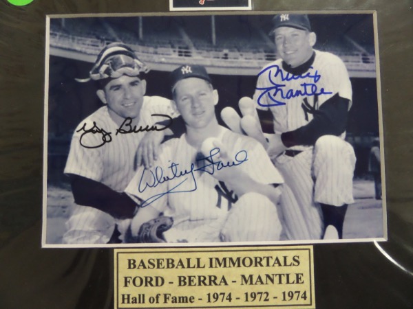 This 8x10 custom matted photo-display holds a triple signed 1950's B&W photo of Mickey, Yogi and Whitey, and is sharpie signed perfectly by all 3 late, great Yankee HOF Greats. This is a 10 all over, has a team sticker added at the top, and value is mid to upper hundreds.  