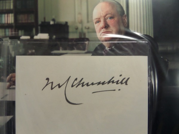 This vintage cut of white paper measures about 2.75x4.75, and features a fountain pen ink signature of British Prime Minister and WWII global figure, Winston Churchill.  This is a very nice-looking autograph, grading about a 9, and it comes with a color photo to make your very own framed/matted display.  Valued into the low thousands!