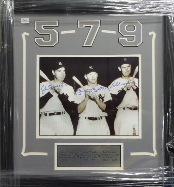 This 19x20 professionally-framed and double-matted display features a custom engraved nameplate with stats, and has the numbers of the three players shown etched right into the matting.  Also included is a black and white 1951 image of Joe DiMaggio, Mickey Mantle and Ted Williams, hand-signed in blue sharpie by all three!  It is ready to hang on the wall and enjoy, and can easily fetch high hundreds to low thousands on the retail circuit!
