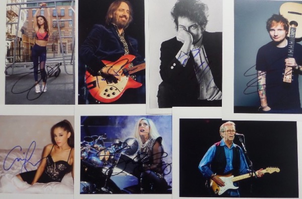 This high value opportunity is FORTY-FIVE photos, each a frame-worth8x10 or 8.5x11, and each hand-signed by the musical celeb(s) shown.  Included are Motley Crue, Blink 182, Def Leppard, Green Day, Fleetwood Mac, AC/DC, Shawn Mendes, Ed Sheeren, Bob Dylan, Miley Cyrus, Billy Idol, Keith Richards, Madonna, Tupac Shakur, Paul McCartney, Tom Petty, Bruce Springsteen, Lady Gaga, Eric Clapton, Katy Perry, Taylor Swift, Robert Plant, Mick Jagger, Justin Bieber, Britney Spears, Ariana Grande, Pink, Selena Gomez and the great Stevie Wonder.  Many dups here, making it a perfect dealer lot, and with an accompanying LOA from The Joe DiMaggio Estate, retail is well into the thousands!