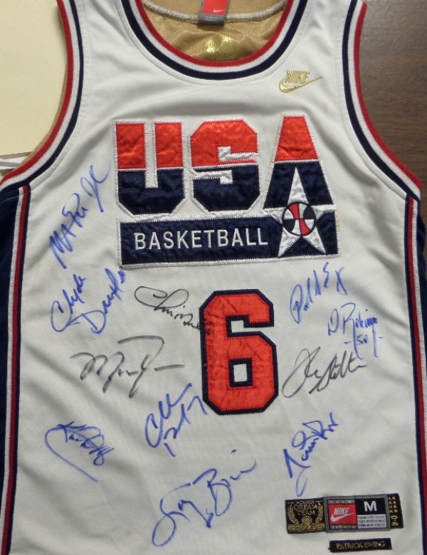 This EX/MT home white size M USA Basketball #6 Ewing jersey is trimmed in team USA red and blue colors and has sewn on everything as well as name on back. Great look from Nike, front side signed by everyone in bold black and blue sharpie, and grading a 8 or better all over. Of course Jordan, Bird, Barkley, Magic, Ewing, Malone and the rest are here, and values can reach thousands!!! Historic basketball piece, and sold here with NO reserve! 