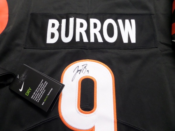 This Cin. road black is trimmed in team white and orange colors, has sewn on everything as well as name on back, and comes back #9 signed by the AFC stud QB in bold black sharpie. It grades a clean 10 all over with his #9 included and value is high-hundreds as the Bengals are so close to winning it all soon. 