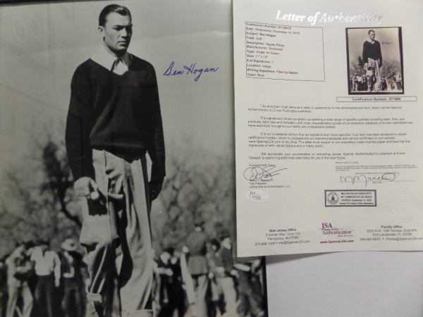 This framed black and white 11x14 photo is an image of Ben Hogan on the golf course.  It is hand-signed in blue sharpie by the PGA HOF'er and all time great himself, and comes with a full photo LOA from JSA (Z71804) for authenticity.  Valued well into the hundreds from this long-deceased legend!