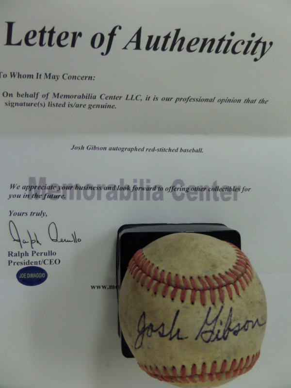 This vintage red-laced baseball is cubed in G overall condition, with no manufacturer's label visible.  It is hand-signed right across the sweet spot by HOF Negro League giant Josh Gibson in black ink, grading about a 7 overall, and the ball comes with a full LOA from The Joe DiMaggio Estate for authenticity purposes.  Valued well into the thousands from this long-deceased HOF great!
