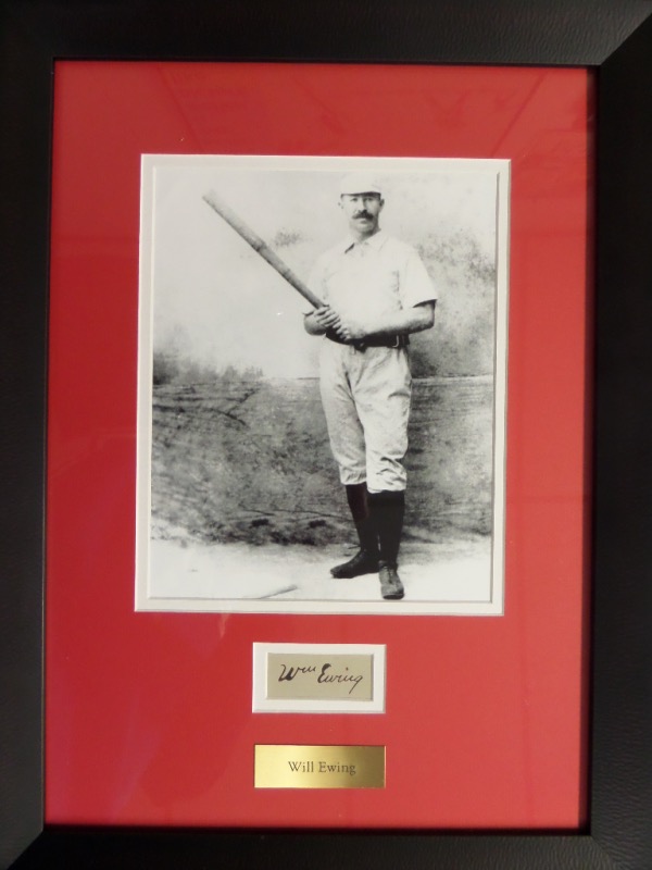 This 15x20 professionally-framed and double-matted display features a custom gold metal nameplate, a black and white photo, and a cut, hand-signed in black fountain pen by 19th Century MLB hero, Buck Ewing.  The signature grades a legible 8, and comes double certified by both Chris Morales and The Joe DiMaggio Estate for authenticity purposes.  Ready for display and valued into the low thousands!