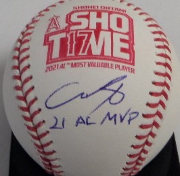 This Angels "ShoT17me" logo baseball is in NM/MT condition, and comes side panel-signed in blue ink by the AL MVP himself, pitcher/outfielder, Shohei Ohtani.  Signature here is an 8.5 at least, including a 21 AL MVP inscription, and the ball is valued well into the hundreds!