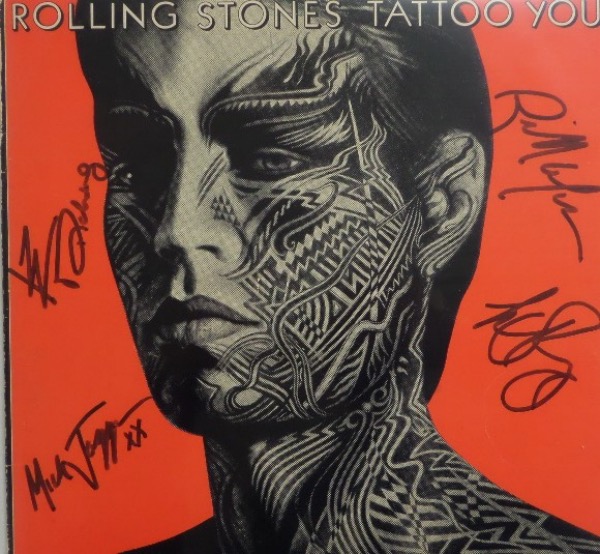 This 1981 classic "Tattoo You" LP album comes cover signed in black sharpie by four Stones responsible for its creation.  Included are Ronnie Wood, Charlie Watts, Bill Wyman, Mick Jagger, and Keith Richards, and each signature is a 7.5 or better  What a wonderful display item for any rock and roll collection, and one that books in the high hundreds!  GTE Sports Stars & Memorabilia COA included for authenticity!