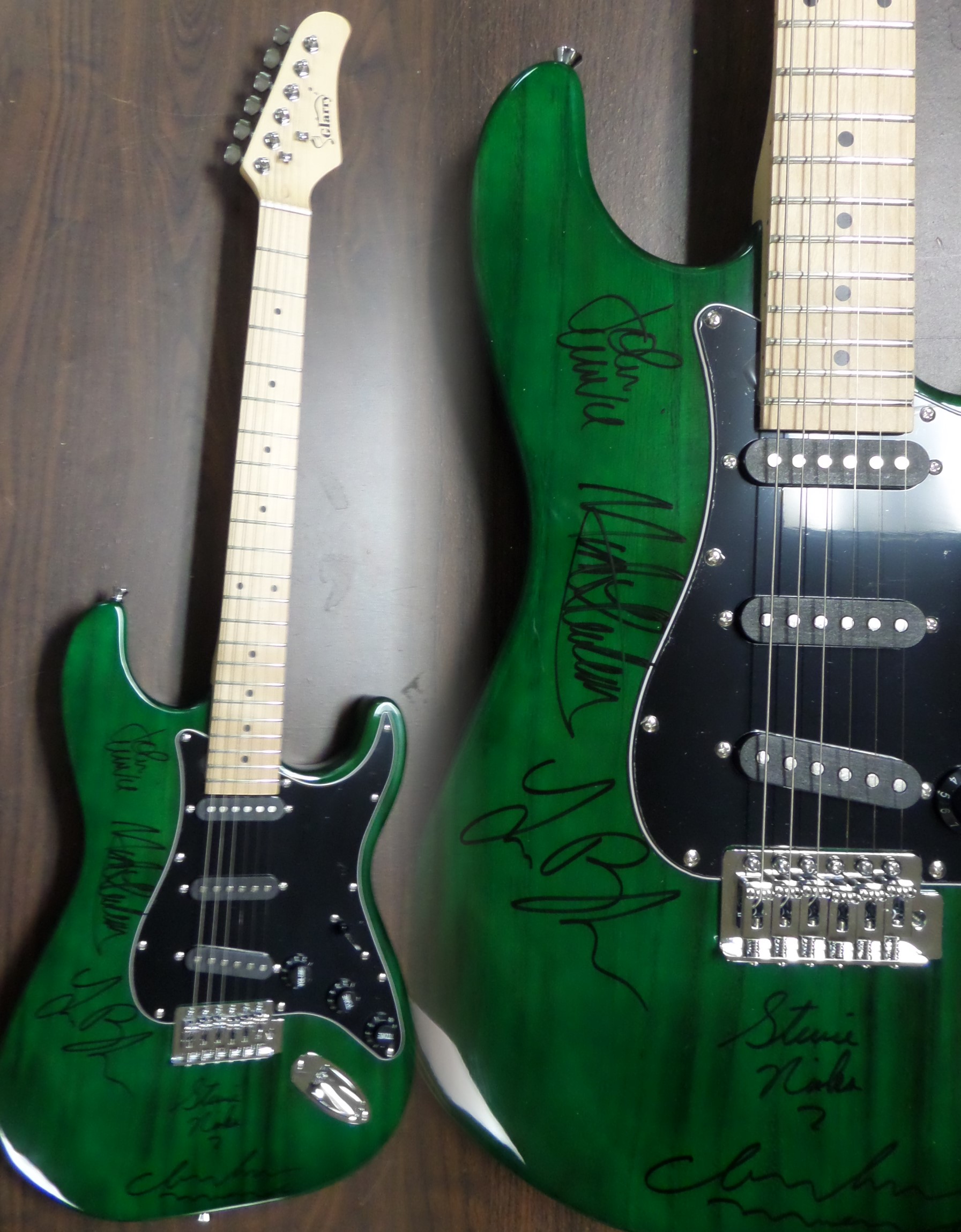 This GORGEOUS mint electric guitar is great-looking, and comes signed by ALL 5 legends from this history-making band in gorgeous silver sharpies! Included are MICK, STEVIE, LINDSEY, JOHN, & CHRISSY!!!  Very rare and comes with case, straps, cords,etc. in original box. Retails well into the low thousands easily and displays perfectly and ideal for the Rock collector.