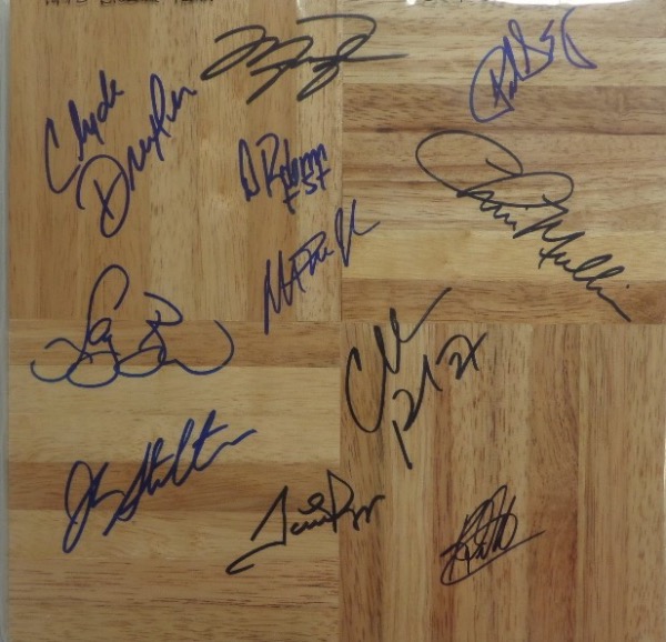 This MINT condition 12x12 floor board piece comes black/blue sharpie signed by all 11 professional members of the original '92 "Dream Team!"  Included are Bird, Magic, Barkley, Robinson, Ewing, Mullin, Drexler, Malone, Stockton, Pippen and Jordan, and this piece values into the mid hundreds, at least!