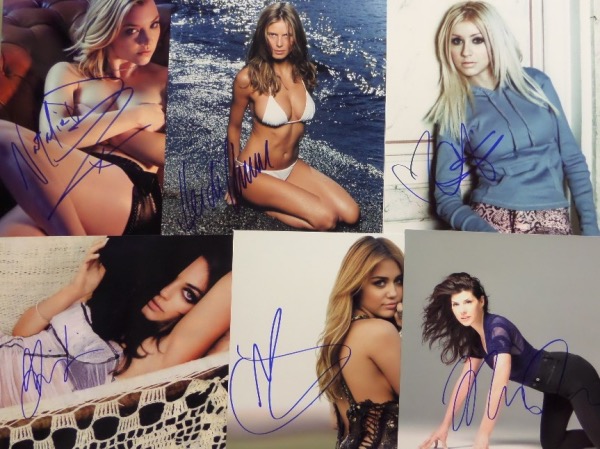 This high value celeb lot is TWENTY-FIVE different 8x10 photos of some of the sexiest, well-known female celebrities.  Each is hand-signed by the corresponding woman, and included are names like Natalie Dormer, Miley Cyrus, Heidi Klum, Sofia Vergara, Kim Catrall, Marisa Tomei, Keira Knightley, Uma Thurman, Claire Danes, Christina Aguilera, Renee Zellweger, Rose Byrne, Chloe Moretz, Rosamund Pike, Anna Kendrick and more.  A virtual Who's Who of hotties here, and retail is easily into the thousands!