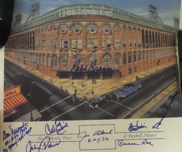 This full color litho print measures 14.5x16 in size, and is a fantastic image of the cathedral that was Ebbets Field.  It comes hand-signed in bold blue sharpie by no less than 8 historic figures in Brooklyn Dodgers history, including Ralph Branca, Duke Snider, Clem Labine, Don Newcombe, Joe Black, Johnny Podres, Preacher Roe and Carl Erskine.  Signature look simply gorgeous, and with only Erskine still living, retail on this beauty is low thousands!!!