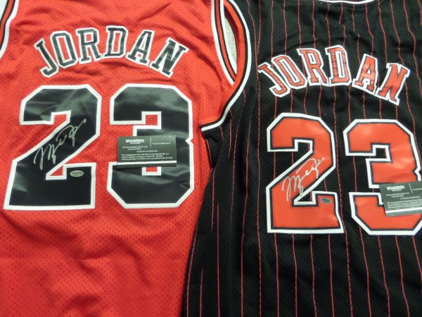 This savvy investment lot is TWO signed Jordan jersey for one bid, and both come tagged right, and feature sewn on everything. Great chance, both signed at celeb golf tourneys in perfect silver, and both come certed and hologrammed for life by numbered InPerson Authentics. Wow..Huge value, thousands for sure...