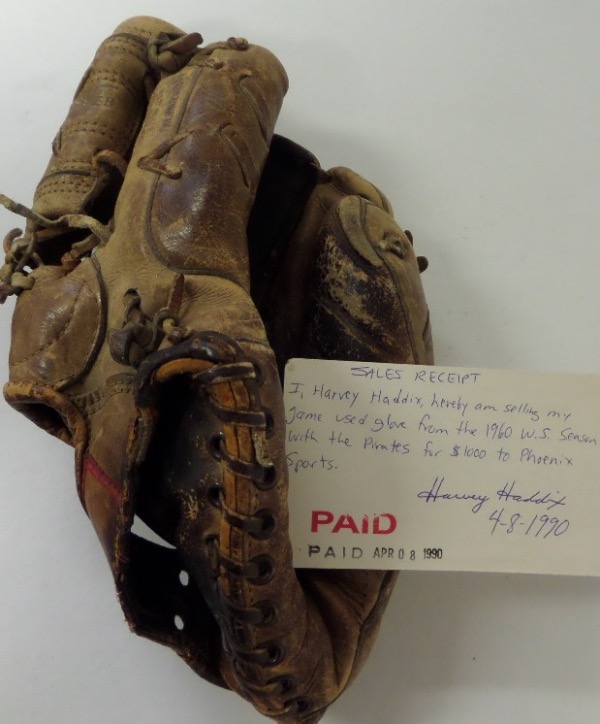 This old time, well used Big League glove was used by the star pitcher during the 1960 world series season, and comes with a PSA authenticated and hand signed note from Haddix himself. It is dated from 1990 when he sold the glove, and value of this important Three Rivers relic is ???