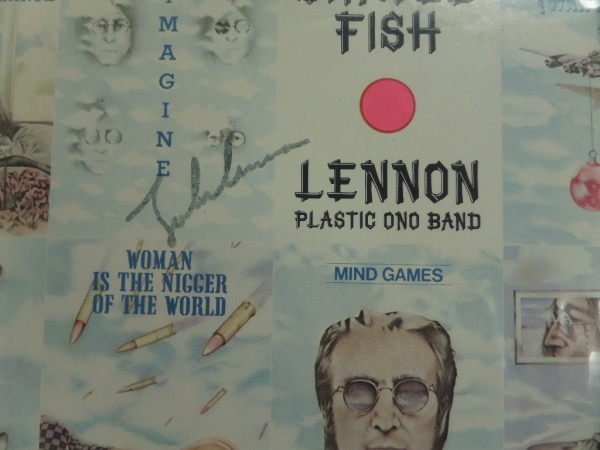 This original 1970's "Shaved Fish" compilation album is chock full of Lennon's solo hits, and comes front cover-signed in black felt marker by the man himself.  This is a lighter signature, grading a legible 6, and the album comes with a photo COA from GTE Sports Stars & Memorabilia. With Lennon's tragic murder now more than 40 years ago, is valued into the high hundreds!