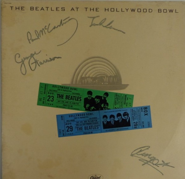 This original "The Beatles At The Hollywood Bowl" LP album is in EX+ condition and comes autographed by ALL FOUR members of the greatest band ever!  Included are Paul McCartney, Ringo Starr, George Harrison and John Lennon, all in black felt tip marker, and all fantastic signatures, grading 8's or better against the light colored backing of the album cover.  ROC Memorabilia certified, and valued well into the low thousands!!!