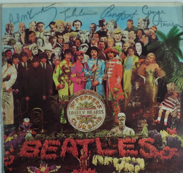 This original "Sgt. Pepper's Lonely Hearts Club Band" album is still in EX condition, with the iconic 1960's image on the front. It is black felt marker-signed by all four of The Fab Four, including John, Paul, George and Ringo, with their signatures grading 6-7's on average, and the album is valued well into the thousands!