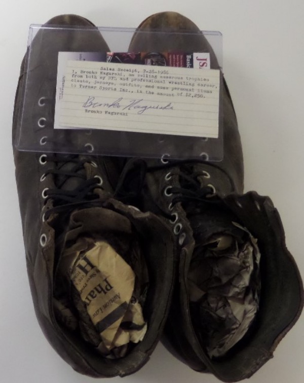 This Canton worthy display and investment lot is pair of his old game used football shoes, comes with a JSA certified hand signed note from the NFL HOF Great, and is dated from 1986 when he sold some of his stuff for auctions. Great lot, certainty too, and value could be thousands on these relics worn by a Gridiron God.