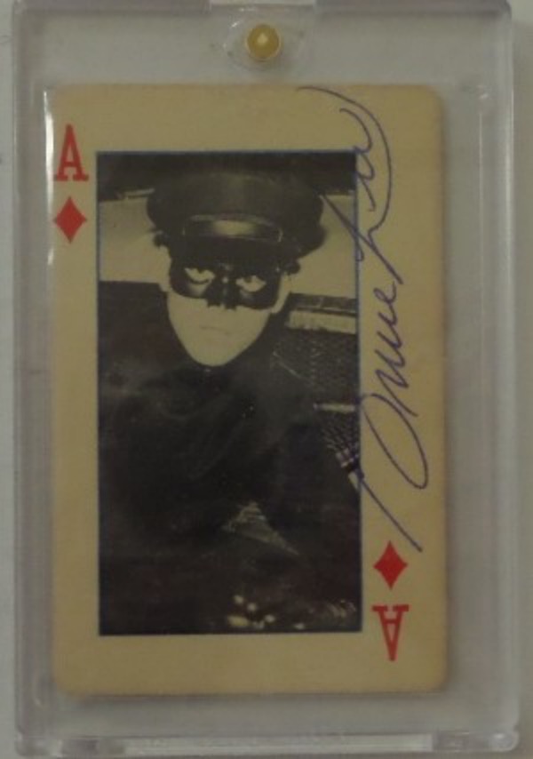This very rare late 60's item is a real playing card with Bruce Lee dressed as Kato on it, and comes side panel signed by the long gone Kung-Fu star in bold, legible blue ink. The signature and card are both strong 9's, come slabbed for easy show off, and value is $2000.00 we believe.  