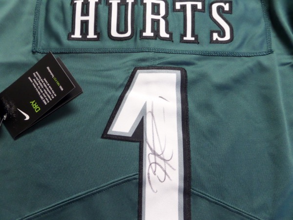 This mint dark green Birds jersey is authentic and comes signed by this young QB wonderfully in black with his #1 included! A MUST for the Eagles fan and retail is in the mid hundreds+ and rising. Eagles could do BIG things next year, so get it now as he barely lost the Super Bowl and MVP race this past year!!