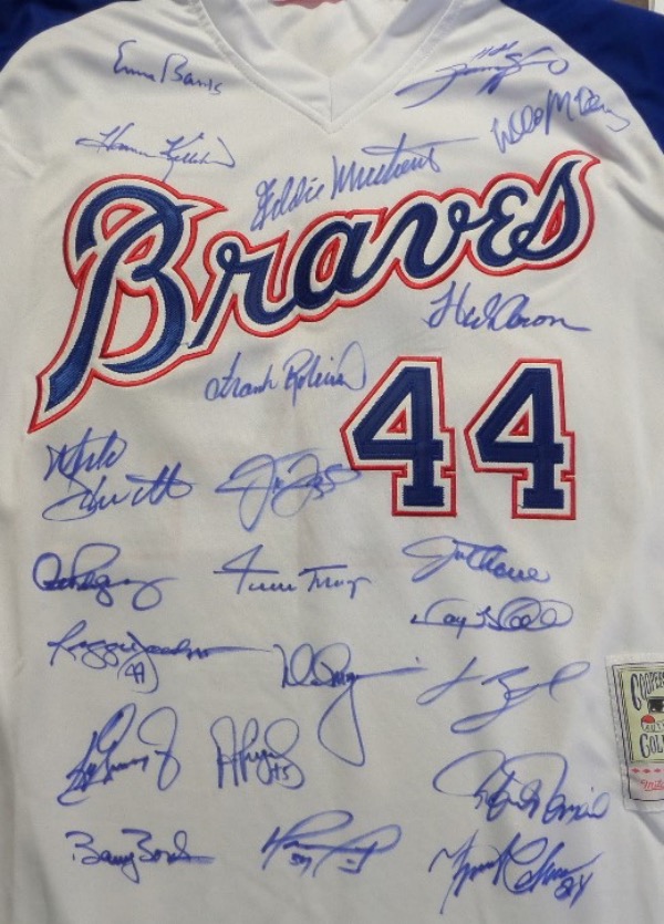 This Hank Aaron #44 custom white size L throwback Braves jersey from Mitchell & Ness is in NM condition, and has everything nicely sewn.  It comes front-signed by no less than TWENTY-THREE different members of the famed 500 Home Run Club, including Murray, Schmidt, Mays, Killebrew, Robinson, Sheffield, McGwire, ARod, Griffey Jr, Thome, Manny, McCovey, Reggie, Cabrera, Mathews, Banks, Palmiero, Ortiz, Sosa, Pujols, Bonds, Thomas and even Aaron himself!  What a fabulous jersey, and with 5 of the 23 now deceased, retail is into the low thousands!