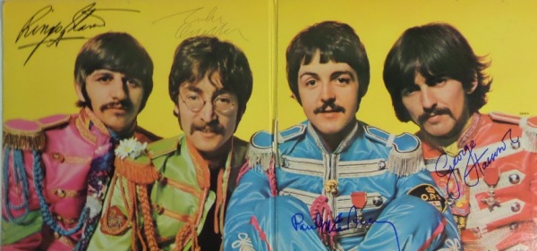 This vintage 1967 "Sgt. Pepper's Lonely Hearts Club Band" LP album is in EX overall shape, and opens to an image of The Fab Four against a yellow background.  It comes ink signed by John Lennon, sharpie signed by Paul McCartney, Ringo Starr and George Harrison, and looks absolutely GORGEOUS!!!  Retail is well into the thousands!