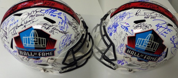 This mint, full-sized Riddell Pro Football Hall of Fame helmet has the colorful HOF logo's all over, and comes sharpie signed by 40+ Legends. It looks simply stunning with the likes of LT, T.O., Dawk, Elway, Kelly, Irvin, Rice, Bettis, Long, Favre, Moss, Montana, Manning, Namath, Bradshaw, Urlacher, Emmitt, LT, and so many more gracing it in blue and black sharpie. Sure to make any NFL fan happy, and with only HOF Greats signing it--no junk!
