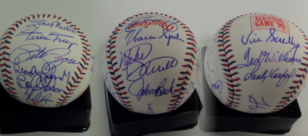 This Official 1999 All Star Game baseball from Rawlings is cubed in NM condition, and is laced in red and blue.  It comes hand-signed all over in blue ink by 19 members of the famed All Century Team, chosen in 1999.  Included are Hank Aaron (ss), Clemens, McGwire, Ripken, Banks, Berra, Griffey, Spahn, Schmidt, Bench, Williams, Koufax, Scully, Musial, Mays, Rose, B. Robinson, Gibson and Ryan.  A stunning baseball with so many all time greats, and with 8 now deceased, retail is low thousands!!!