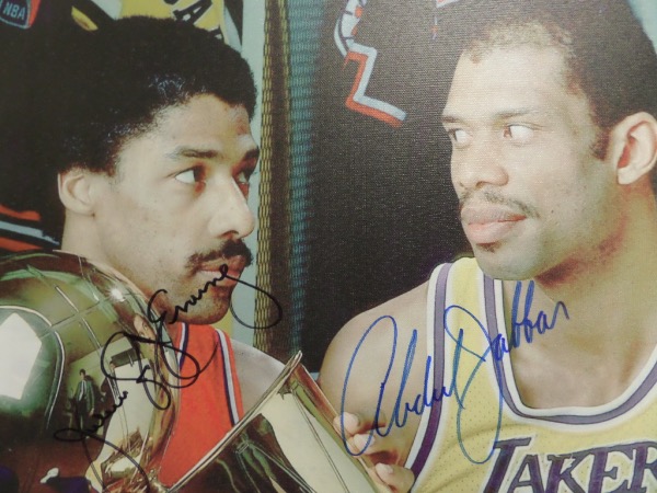 This real canvas work is a gem, shows both NBA HOF stars posing, and comes boldly, black and blue marker signed by BOTH tough signers on terrific spots. It grades a clean bold 10 all over, measures a whopping 20x24 in size, and value is over a grand for sure. It is a circa 1981 pose, and belongs in every NBA collection.