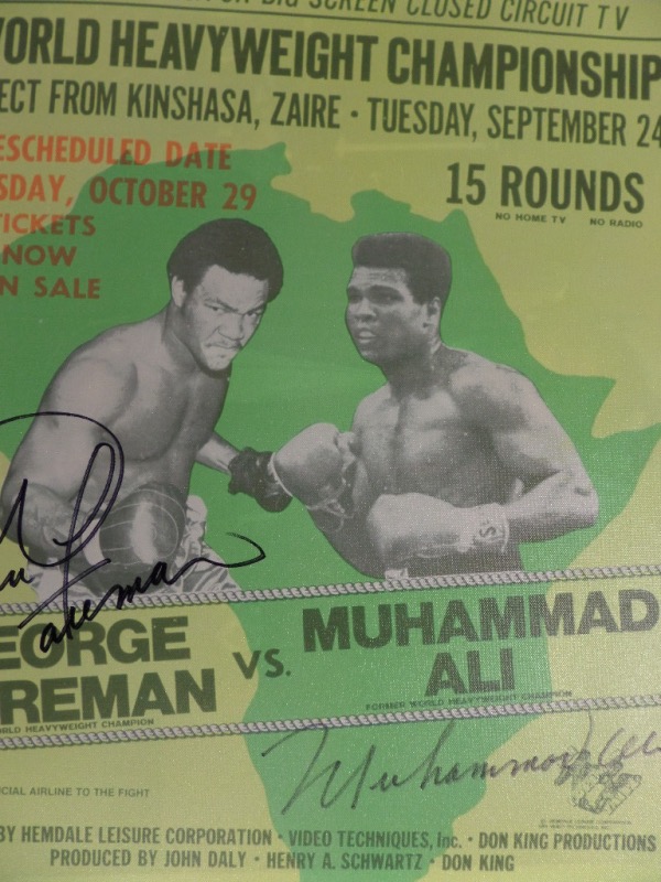 This real canvas work is a gem, shows both 1975 HOF fighters from Zaire, and comes boldly signed on terrific spots by both "Big George & the Greatest". It grades a clean bold 10 all over, measures a whopping 20x24 in size, and value is over  two grand for sure. Terrific 1975 era boxing poster piece, and an easy HOF investment.