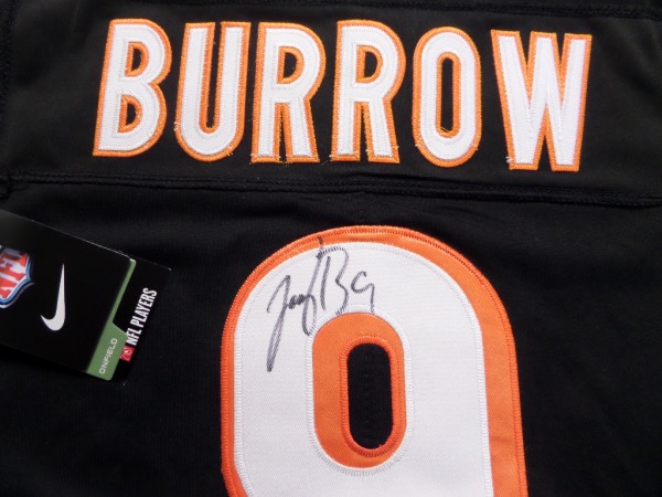 This Cin. road black is trimmed in team white and orange colors, has sewn on everything as well as name on back, and comes back #9 signed by the AFC stud QB in bold black sharpie. It grades a clean 10 all over with his #9 included and value is high-hundreds as the Bengals are so close to winning it all soon. 