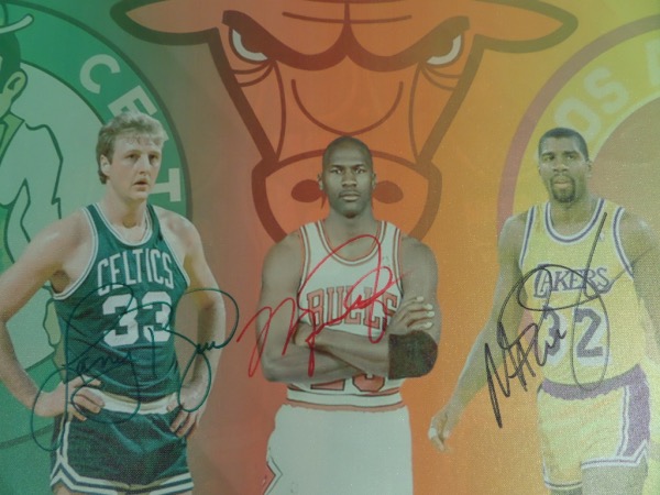 This awesome 20x28 real canvas work shows three Olympic/ NBA Greats in a 1992 pose, and comes hand signed by each on a terrific spot. It grades a clean bold 10 all over, shows off well from 30 feet away, and value with all 3 HOF Greats on it is about $2500.00.