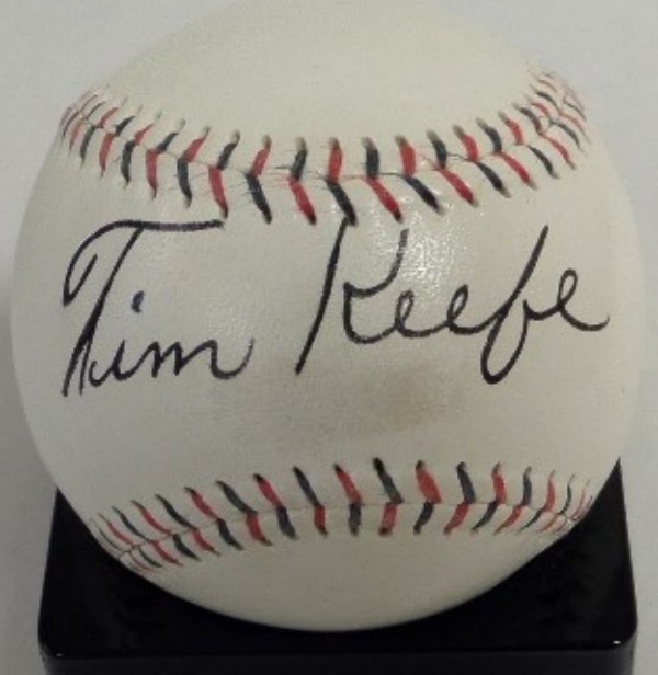 This red and blue-stitched vintage baseball is in VG+/EX overall condition, and comes black ink-signed against the sweet spot by 344 Game Winner and HOF New York Giants righty, Tim Keefe.  The signature grades a legible 6, and the ball comes with a full photo LOA from Halper Bros., Inc. for authenticity purposes.  Valued at $7,000.00 and an outstanding HOF collector's item!