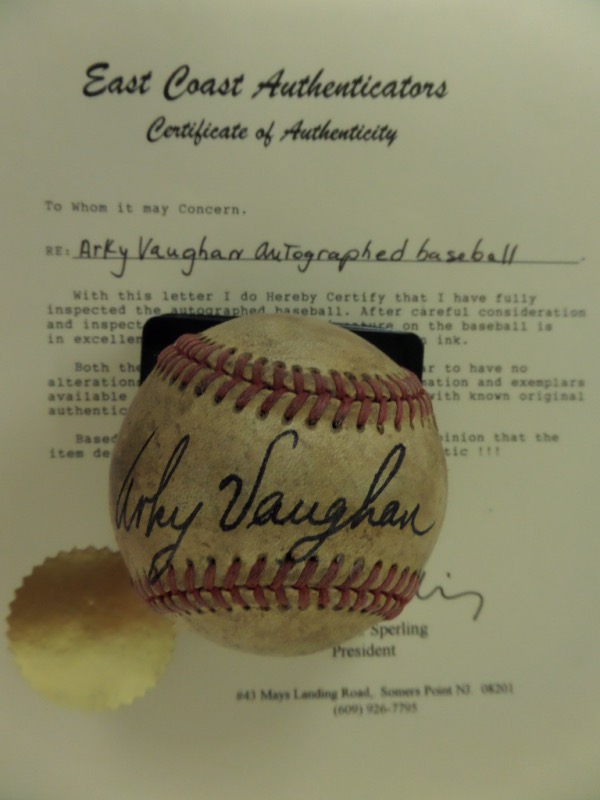 This vintage 1930's baseball is red-laced and unmarked and comes sweet spot-signed by HOF Pirates shortstop, Arky Vaughan.  The signature grades a legible 6.5-7, and the ball is accompanied by a full LOA from East Coast Authenticators for authenticity purposes.  Valued well into the thousands!