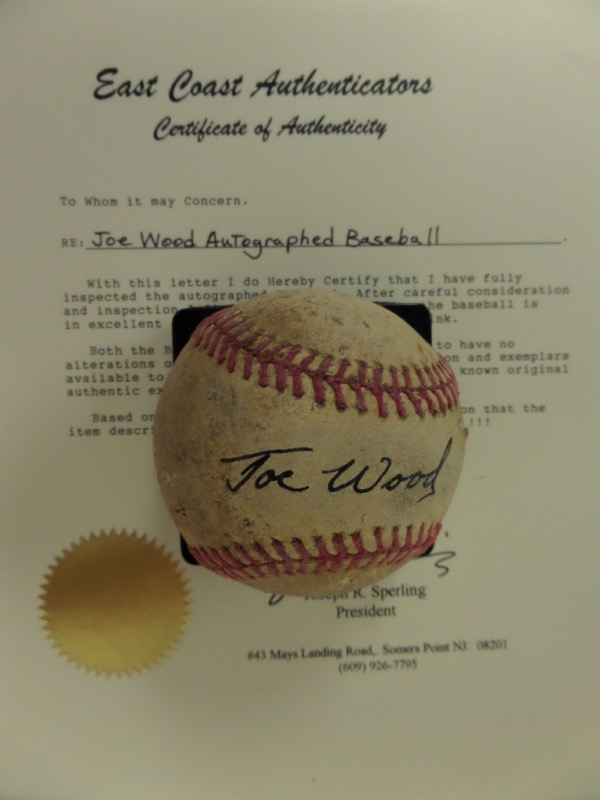 This very old, red-laced baseball is still in G overall condition, and comes hand-signed across the sweet spot in black by 1912 Red Sox ace and World Series hero, Joe Wood.  The signature reads Joe Wood, grades an overall 7, and the ball includes a full LOA from East Coast Authenticators for certainty. Valued into the low thousands!