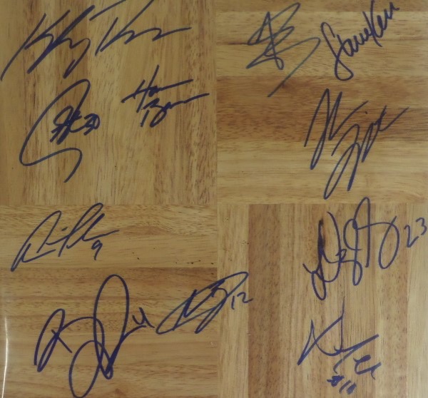 This 12x12 large wooden floor board is in NM condition and comes blue sharpie-signed by head coach Steve Kerr and 10 of his NBA Champions.  Included are Steph Curry, Klay Thompson, Draymond Green, Shaun Livingston, Matt Barnes, Andre Iguodala, and all the rest.  A gorgeous display item, valued well into the hundreds!