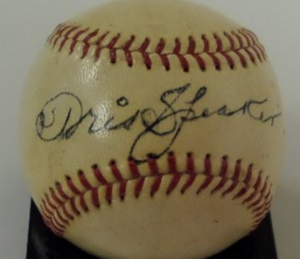 This very old Official National League Baseball from Spalding (Giles, President) is laced in red and in EX overall condition.  It is penned stunningly on the sweet spot in bold black fountain pen ink by The Grey Eagle himself, 1937 HOF Inductee, Tris Speaker.  This signature grades an overall 7-7.5, and the ball is valued well into the thousands!