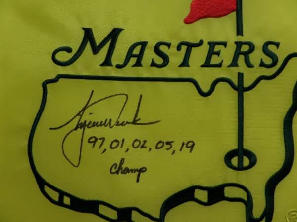 This mint, real pin flag is from Augusta, site of the tournament, and comes hand signed by THE Tiger Woods!!! It grades a bold 8 in black sharpie, has the 5 years that he won written and listed, followed by the word Champ, and value can reach thousands on the reluctant signer. Solid buy and hold investment, in the still ever popular star!
