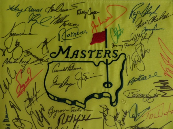 This yellow Masters pin flag is in MINT condition, and comes hand-signed in black, blue, green and red sharpie by 40 past champions of the major tournament.  Included are Palmer, Player, Nickklaus, Faldo, Nelson, Mickelson, Zoeller, Langer, Watson, Snead, Singh, Crenshaw, Floyd, Woods, and many more, and with so many legends on one piece, retail is THOUSANDS!