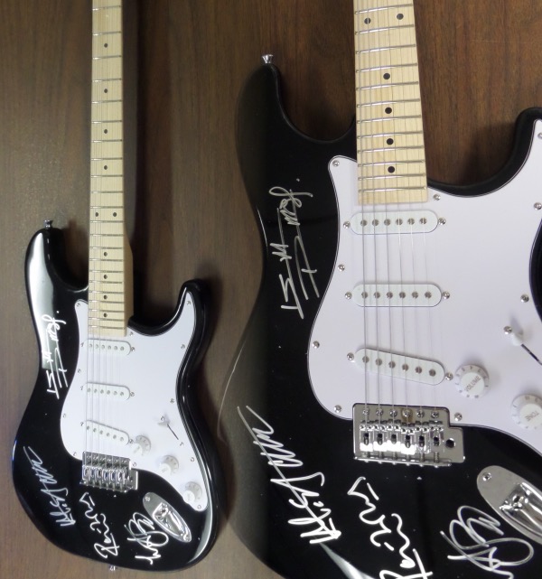 This beautiful black Fender Stratocaster style electric guitar is in MINT condition, and comes hand-signed in silver by all four longtime members of the world's most recognizable rock band, The Rolling Stones.  Signatures are bright, and each grades a legible 8.5 at least.  Included are Ron Wood, Mick Jagger, Charlie Watts and Keith Richards, and with Watts' recent passing, the already sky-high retail value of this baby shoots ever upward!
