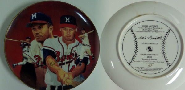 This awesome, full color ceramic plate is long sold out, just 512 in the edition, and shows the late 500 HR Hitter in several poses from the 1950's and in his Milwaukee Braves uniform. It is a real beauty, artwork by Chris Paluso and gold paint pen signed by the late Cooperstown great. It is new all over, an honest 10, and comes in the original Hackett plate box. Retail value is now $325.00 and that's only IF you can find them...