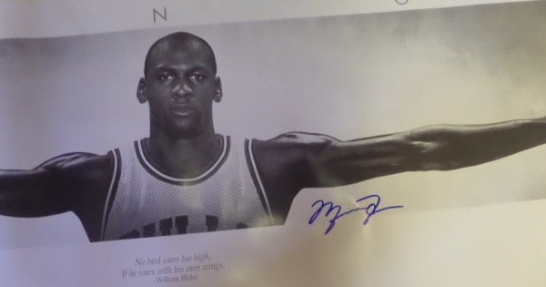 This full-sized 6 foot poster is a 1990's beauty from Nike and shows the HOF Great with his arms stretched out. It has some dings on it, comes boldly blue sharpie signed by Jordan, and shows off well from a football field away. and value is obviously thousands!!! Great chance, and an easy investment as well. 