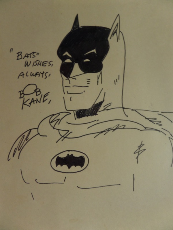 This 1990 era work is all in his hand, shows the caped crime fighter in a superb chest/head pose, and comes hand signed by the talented creator/artist. It is about 7x8 in size, on old manilla paper, and value is about a grand on his originals. 