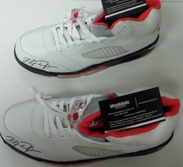 This must have display lot is TWO signed sneaks, both from his own Nike brand and done in old school style with white, black and red colors. Each comes perfectly toe signed by the Greatest ever in bold black sharpie, and both also come fully lifetime certified by InPerson Authentics via their COA and added lifetime holograms. Wow!!!