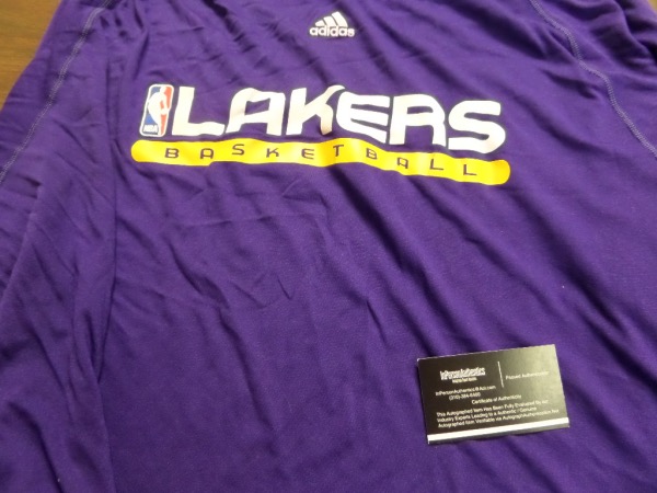 This impossible lot was obtained by an NBA insider from InPerson Authentics, and is a real team issued shooting shirt from THE Kobe Bryant!!! Great chance, one of a kind, and a size XXL from Adidas. It shows multiple washings so you know he wore it, and we'll include their COA to boot. Don't EVER look for another one!!!